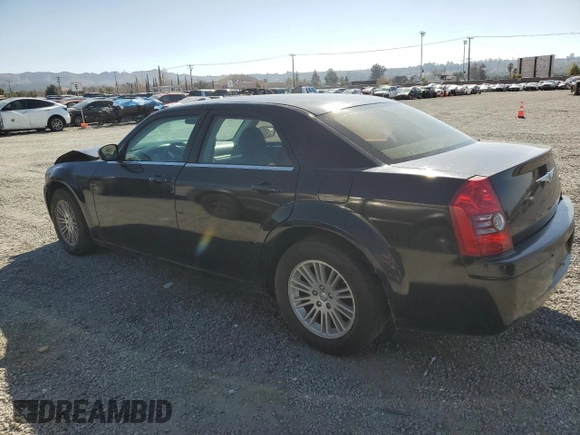 2009 Chrysler 300 LX with VIN 2C3KA43D59H529761, listed as a Copart auction lot 44260275 with 135,802 mi miles and Salvage Title. Bid and sale history available at carsss.com. Image 2.