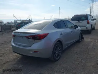 2018 Mazda Mazda3 4-Door Touring with VIN 3MZBN1V37JM262418, listed as a IAAI auction lot 41880212 with 118,662 mi miles. Bid and sale history available at carsss.com. Image 4.