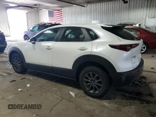 2021 Mazda CX-30 S with VIN 3MVDMBAL8MM214214, listed as a Copart auction lot 58583995 with 98,877 mi miles and Salvage title. Bid and sale history available at DreamBid. Image 2.