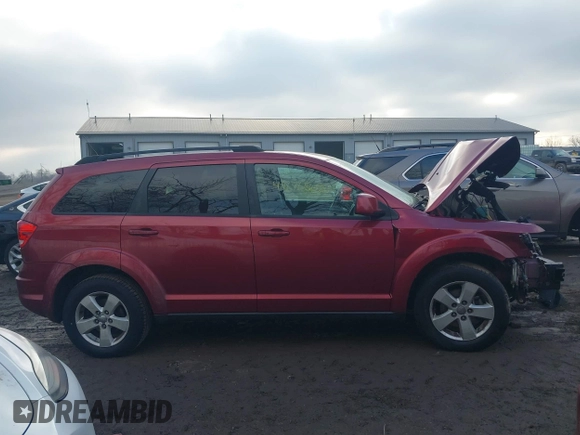 2011 Dodge Journey Mainstreet with VIN 3D4PG1FG5BT517517, listed as a IAAI auction lot 41676503 with 173,836 mi miles and . Bid and sale history available at DreamBid. Image 13.