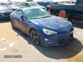 2015 Scion FR-S z VIN JF1ZNAA17F9700761, wystawiony jako IAAI lot #42182185 z przebiegiem 140 415 mil mil oraz . Historia ofert i sprzedaży dostępna na DreamBid. Obrazek 1.