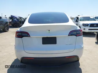 2023 Tesla Model Y Long Range z VIN 7SAYGDEE5PA104635, wystawiony jako IAAI lot #41989014 z przebiegiem 15 347 mil mil oraz . Historia ofert i sprzedaży dostępna na DreamBid. Obrazek 16.