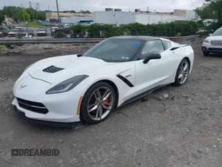 2015 Chevrolet Corvette Z51 3LT z VIN 1G1YM2D72F5119618, wystawiony jako IAAI lot #42744702 z przebiegiem Nie podano mil oraz . Historia ofert i sprzedaży dostępna na DreamBid. Obrazek 18.