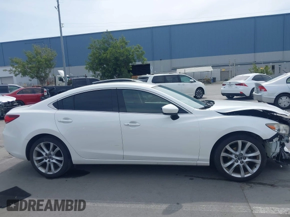 2016 Mazda Mazda6 i Touring with VIN JM1GJ1V57G1429887, listed as a IAAI auction lot 42029170 with 140,519 mi miles. Bid and sale history available at carsss.com. Image 13.