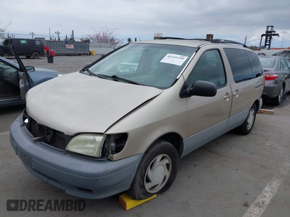 2002 Toyota Sienna LE with VIN 4T3ZF13C92U469670, listed as a IAAI auction lot 42141259 with 222,299 mi miles and . Bid and sale history available at DreamBid. Image 2.