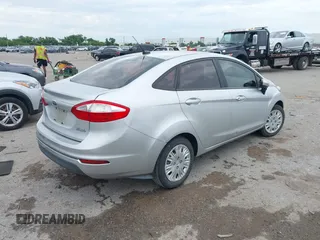 2015 Ford Fiesta S with VIN 3FADP4AJ0FM145594, listed as a IAAI auction lot 42368055 with 142,169 mi miles and . Bid and sale history available at DreamBid. Image 4.