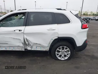 2015 Jeep Cherokee Latitude with VIN 1C4PJLCB0FW761871, listed as a IAAI auction lot 42099336 with 213,049 mi miles and . Bid and sale history available at DreamBid. Image 12.