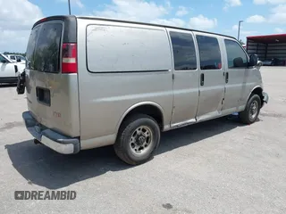 2003 GMC Savana Cargo with VIN 1GTHG35U431146718, listed as a IAAI auction lot 42098826 with 238,502 mi miles. Bid and sale history available at carsss.com. Image 4.
