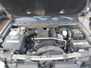 2005 GMC Envoy SLT with VIN 1GKDT13S752276414, listed as a IAAI auction lot 41052684 with 200,919 mi miles. Bid and sale history available at carsss.com. Image 10.
