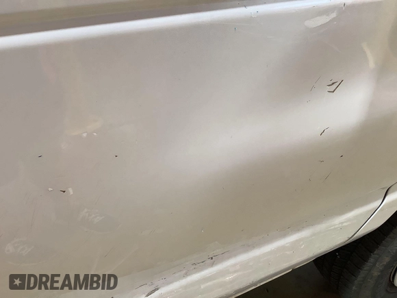 2013 Ford Econoline Cargo Commercial with VIN 1FTNE1EW9DDA61968, listed as a IAAI auction lot 42643038 with 121,719 mi miles and . Bid and sale history available at DreamBid. Image 17.