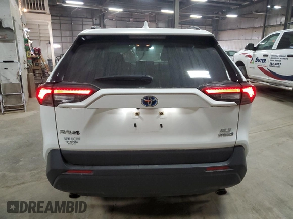 2021 Toyota RAV4 Hybrid XLE with VIN JTMRWRFV3MD127501, listed as a Copart auction lot 84239034 with 75,707 mi miles and Salvage Title. Bid and sale history available at carsss.com. Image 6.
