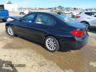 2018 BMW 3 Series 320i with VIN WBA8E1G57JNU89073, listed as a IAAI auction lot 41872759 with Not Provided miles. Bid and sale history available at carsss.com. Image 3.