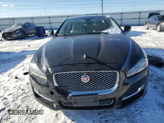 2016 Jaguar XJ Portfolio with VIN SAJWA2G78G8V94534, listed as a Copart auction lot 86926944 with 144,093 mi miles and Salvage title. Bid and sale history available at DreamBid. Image 5.
