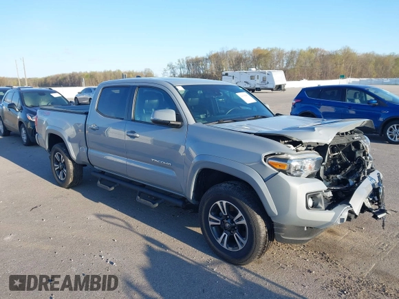 2018 Toyota Tacoma SR5 with VIN 3TMDZ5BN3JM054548, listed as a IAAI auction lot 42038480 with 122,242 mi miles and . Bid and sale history available at DreamBid. Image 1.