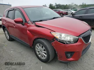 2014 Mazda CX-5 Touring z VIN JM3KE4CY3E0382106, wystawiony jako Copart lot #55521645 z przebiegiem 84 539 mil mil oraz Szkoda całkowita • Salvage title. Historia ofert i sprzedaży dostępna na DreamBid. Obrazek 4.