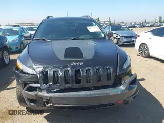 2016 Jeep Cherokee Trailhawk with VIN 1C4PJMBB9GW179051, listed as a IAAI auction lot 42520342 with 100,538 mi miles and . Bid and sale history available at DreamBid. Image 12.