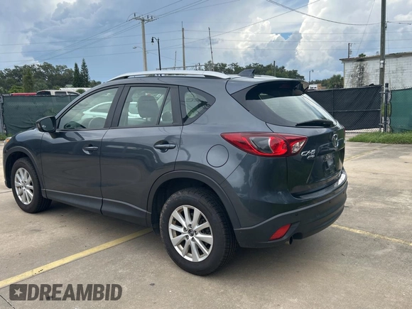 2013 Mazda CX-5 Sport with VIN JM3KE4BE7D0141588, listed as a Copart auction lot 66138585 with 124,920 mi miles and Clean title. Bid and sale history available at DreamBid. Image 3.