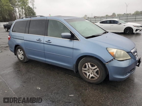 2005 Honda Odyssey EX-L with VIN 5FNRL38645B060123, listed as a Copart auction lot 51112735 with 227,247 mi miles and Salvage Title. Bid and sale history available at carsss.com. Image 4.