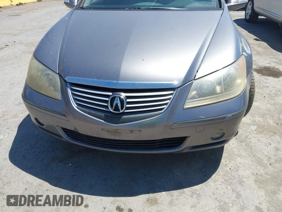 2005 Acura RL z VIN JH4KB16565C002626, wystawiony jako IAAI lot #42522273 z przebiegiem 293 980 mil mil oraz . Historia ofert i sprzedaży dostępna na DreamBid. Obrazek 6.