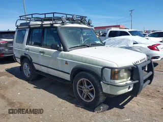 2004 Land Rover Discovery SE z VIN SALTY19484A841591, wystawiony jako IAAI lot #41846869 z przebiegiem 137 886 mil mil oraz . Historia ofert i sprzedaży dostępna na DreamBid. Obrazek 1.