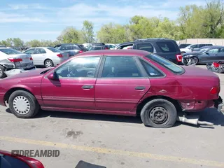 1993 Ford Taurus z VIN 1FACP52U4PG225521, wystawiony jako IAAI lot #42096535 z przebiegiem 76 808 mil mil oraz . Historia ofert i sprzedaży dostępna na DreamBid. Obrazek 14.