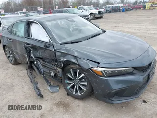 2024 Honda Civic EX-L z VIN 19XFL1H77RE004091, wystawiony jako IAAI lot #42095044 z przebiegiem 22 033 mil mil oraz . Historia ofert i sprzedaży dostępna na DreamBid. Obrazek 1.