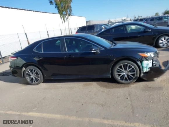 2018 Toyota Camry LE with VIN 4T1B11HK0JU667187, listed as a IAAI auction lot 41816582 with 119,692 mi miles. Bid and sale history available at carsss.com. Image 14.