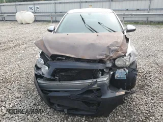 2015 Chevrolet Sonic LS with VIN 1G1JA5SH6F4152196, listed as a Copart auction lot 59096455 with 128,113 mi miles and Salvage title. Bid and sale history available at DreamBid. Image 5.