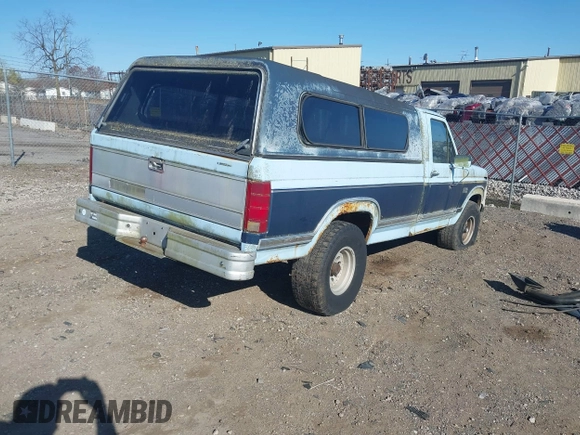 1986 Ford F-150 with VIN 1FTEF14N0GPA37633, listed as a IAAI auction lot 42084341 with 230,894 mi miles. Bid and sale history available at carsss.com. Image 4.