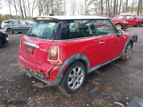 2009 MINI Cooper Hardtop S with VIN WMWMF735X9TT97788, listed as a IAAI auction lot 41925351 with 150,858 mi miles. Bid and sale history available at carsss.com. Image 4.