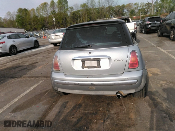 2002 MINI Hardtop with VIN WMWRC33432TE10226, listed as a IAAI auction lot 41973956 with 156,445 mi miles and . Bid and sale history available at DreamBid. Image 16.