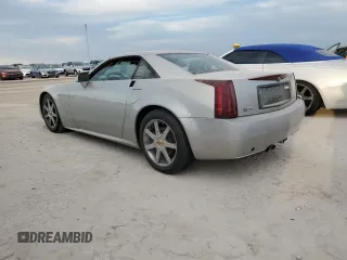 2004 Cadillac XLR z VIN 1G6YV34A045603308, wystawiony jako Copart lot #75459524 z przebiegiem Nie podano mil oraz Szkody całkowita. Historia ofert i sprzedaży dostępna na DreamBid. Obrazek 2.