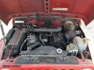 1997 Jeep Wrangler Sport with VIN 1J4FY19S2VP477079, listed as a Copart auction lot 54831895 with 254,358 mi miles and Clean Title. Bid and sale history available at carsss.com. Image 12.