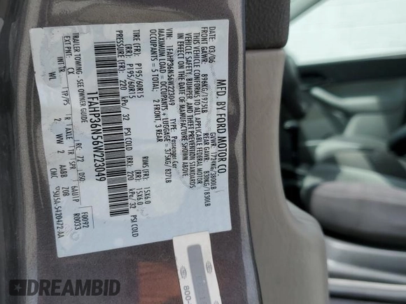 2006 Ford Focus SE with VIN 1FAHP36N56W223049, listed as a Copart auction lot 61211745 with 185,609 mi miles and Salvage title. Bid and sale history available at DreamBid. Image 12.