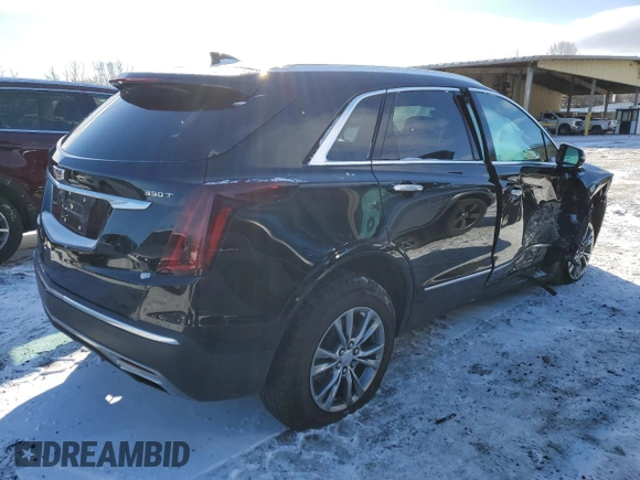 2023 Cadillac XT5 AWD Premium Luxury with VIN 1GYKNDR40PZ136894, listed as a Copart auction lot 45147465 with 42,901 mi miles and Salvage Title. Bid and sale history available at DreamBid. Image 3.