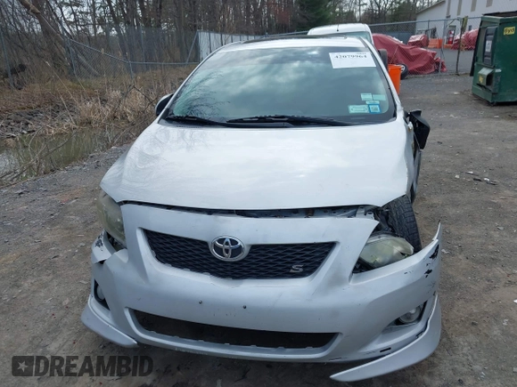 2009 Toyota Corolla with VIN 2T1BU40E69C123823, listed as a IAAI auction lot 42079964 with 204,124 mi miles. Bid and sale history available at carsss.com. Image 12.