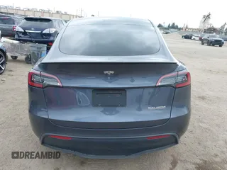 2023 Tesla Model Y Performance z VIN 7SAYGDEF1PF925274, wystawiony jako IAAI lot #42078813 z przebiegiem 20 422 mil mil oraz . Historia ofert i sprzedaży dostępna na DreamBid. Obrazek 15.