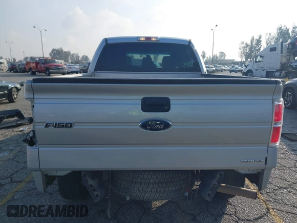 2014 Ford F-150 XL with VIN 1FTFW1EF9EKF99892, listed as a IAAI auction lot 41428456 with 128,659 mi miles and . Bid and sale history available at carsss.com. Image 17.