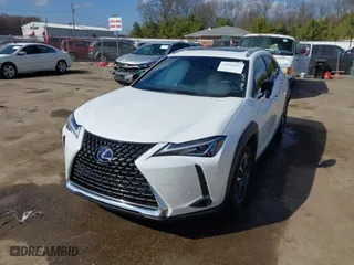 2021 Lexus UX with VIN JTHP9JBH0M2039502, listed as a IAAI auction lot 41868672 with 17,496 mi miles. Bid and sale history available at carsss.com. Image 2.