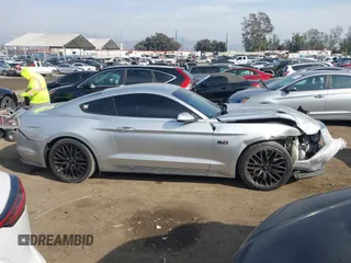 2015 Ford Mustang GT z VIN 1FA6P8CF5F5431729, wystawiony jako IAAI lot #41479277 z przebiegiem 108 809 mil mil oraz . Historia ofert i sprzedaży dostępna na DreamBid. Obrazek 13.