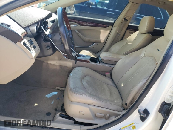 2009 Cadillac CTS RWD with VIN 1G6DV57V390137502, listed as a Copart auction lot 52141235 with 218,772 mi miles and Salvage Title. Bid and sale history available at DreamBid. Image 7.