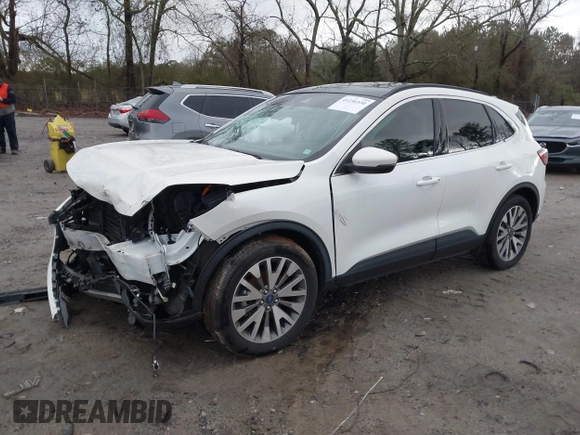 2020 Ford Escape Titanium Hybrid with VIN 1FMCU9DZ0LUC56274, listed as a IAAI auction lot 41256530 with 43,502 mi miles and . Bid and sale history available at DreamBid. Image 18.