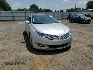 2015 Lincoln MKZ Hybrid z VIN 3LN6L2LU1FR606066, wystawiony jako Copart lot #61955415 z przebiegiem 127 214 mil mil oraz Szkoda całkowita • Salvage title. Historia ofert i sprzedaży dostępna na DreamBid. Obrazek 13.