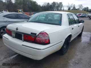 2002 Mercury Grand Marquis GS with VIN 2MEFM74W82X628008, listed as a IAAI auction lot 41576839 with 157,874 mi miles. Bid and sale history available at carsss.com. Image 4.