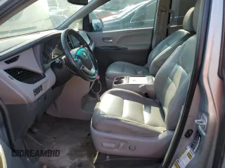 2015 Toyota Sienna XLE z VIN 5TDYK3DC3FS631916, wystawiony jako Copart lot #57876815 z przebiegiem 76 986 mil mil oraz Czysty tytuł • Clean title. Historia ofert i sprzedaży dostępna na DreamBid. Obrazek 7.