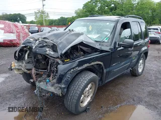2003 Jeep Liberty Limited with VIN 1J4GL58K73W656698, listed as a IAAI auction lot 42529015 with 187,907 mi miles and . Bid and sale history available at DreamBid. Image 2.