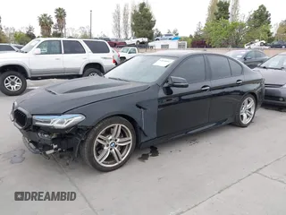2014 BMW 5 Series 535d with VIN WBAXA5C59ED690375, listed as a IAAI auction lot 42030902 with 70,553 mi miles and . Bid and sale history available at carsss.com. Image 2.