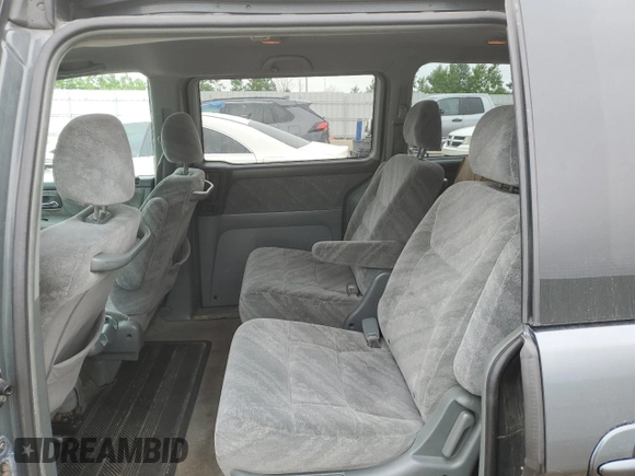 2003 Honda Odyssey EX with VIN 2HKRL18603H008412, listed as a Copart auction lot 87502365 with 352,773 mi miles and Salvage Title. Bid and sale history available at DreamBid. Image 11.