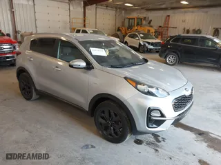 2020 Kia Sportage S with VIN KNDP6CAC3L7813464, listed as a IAAI auction lot 42128252 with 76,271 mi miles. Bid and sale history available at carsss.com. Image 1.