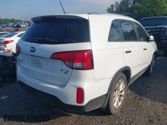 2014 Kia Sorento EX with VIN 5XYKU4A70EG431214, listed as a IAAI auction lot 42231124 with 99,275 mi miles and . Bid and sale history available at DreamBid. Image 4.